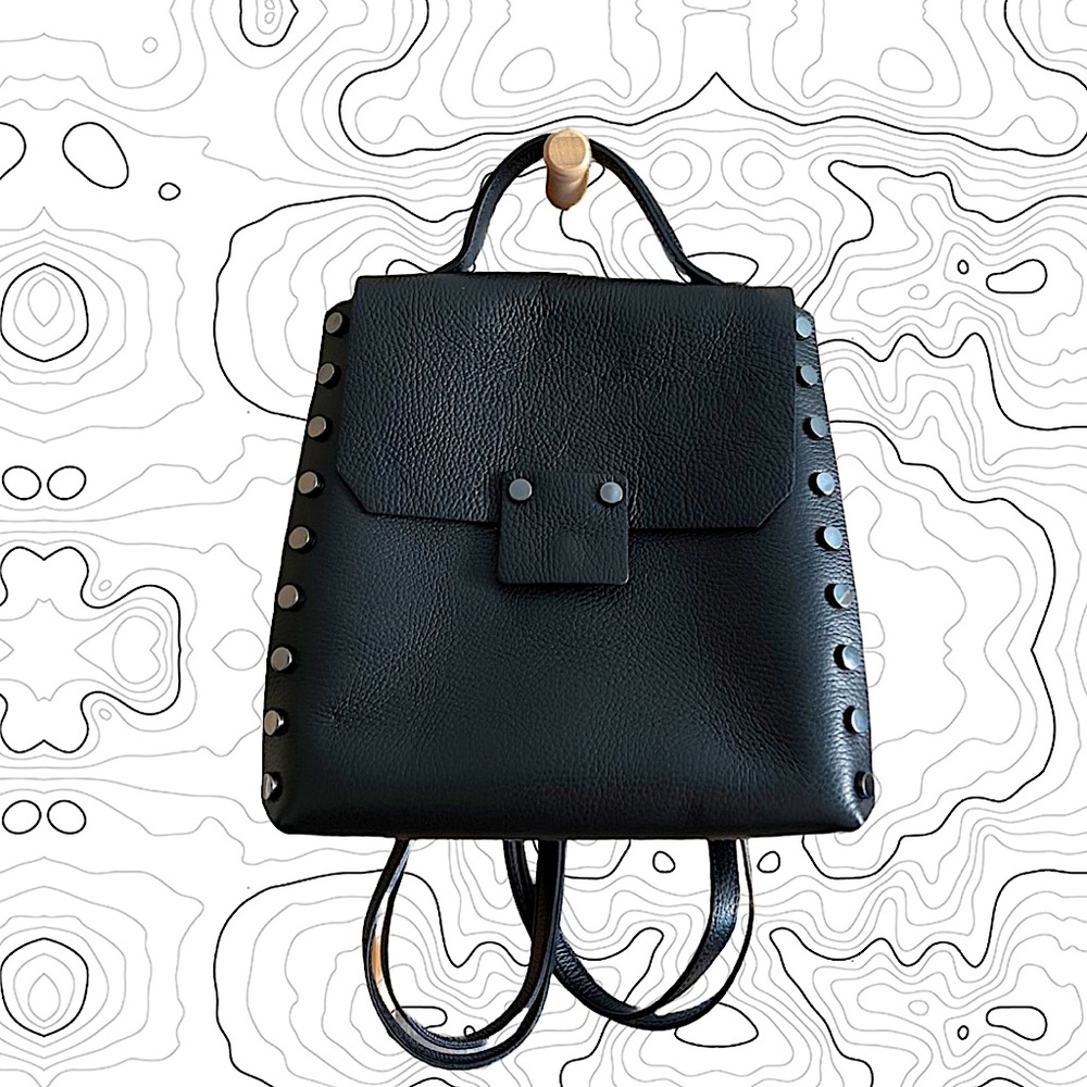 Studded leather backpack like new. No flaws whatsoever.